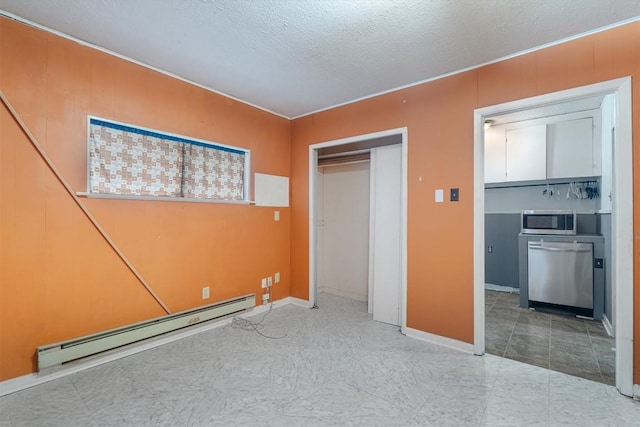 unfurnished bedroom featuring a closet, a textured ceiling, and a baseboard radiator