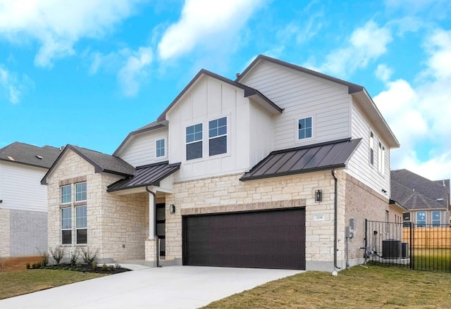 view of front facade with a front lawn and a garage