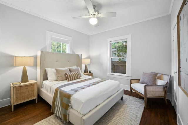 bedroom with ornamental molding, ceiling fan, and dark hardwood / wood-style floors