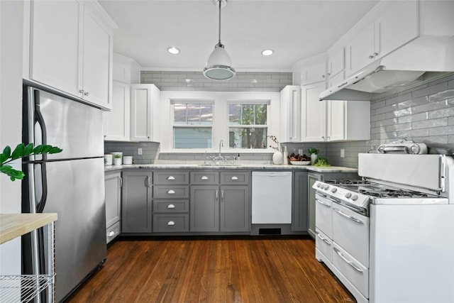 kitchen with white cabinets, gray cabinets, dark wood-type flooring, and white appliances