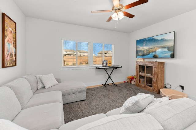 carpeted living room featuring ceiling fan