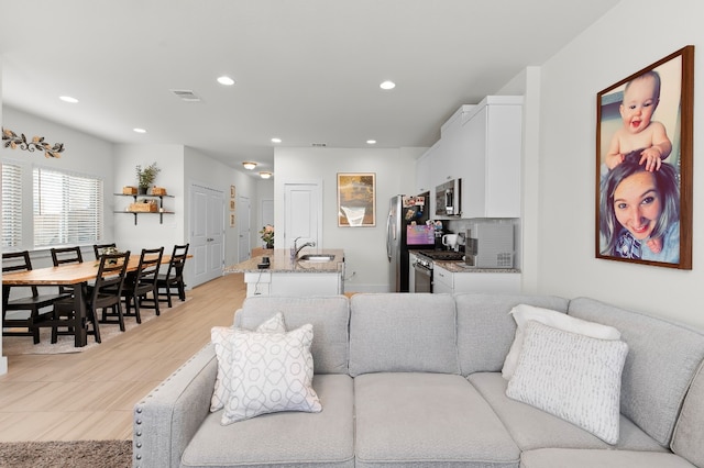 living room with sink