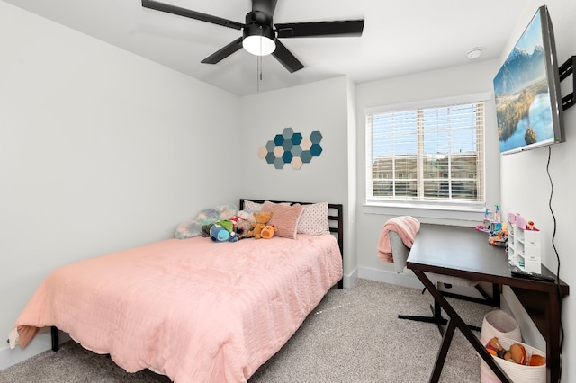 bedroom with light carpet and ceiling fan