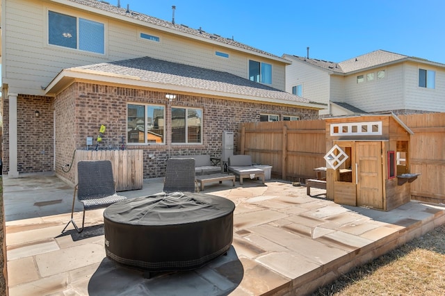 view of patio featuring a fire pit