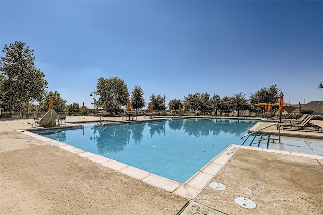 pool with a patio