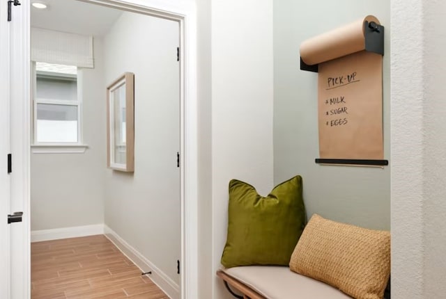 hallway featuring light hardwood / wood-style flooring