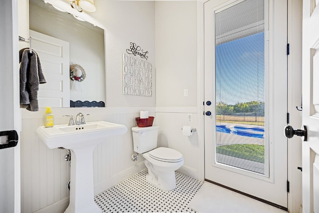 bathroom with sink and toilet