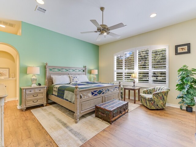 bedroom featuring ceiling fan and light hardwood / wood-style floors