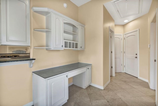 26801 Founders Pl, Spicewood, TX 78669 - kitchen featuring open shelves, baseboards, white cabinets, dark countertops, and recessed lighting