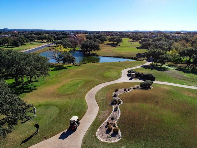 26801 Founders Pl, Spicewood, TX 78669 - aerial view of property and surrounding area with a nearby body of water, a local golf course, and a tree filled landscape