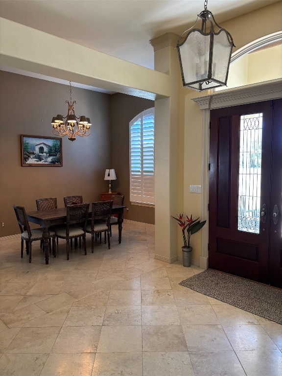 26801 Founders Pl, Spicewood, TX 78669 - dining space with a chandelier and healthy amount of natural light