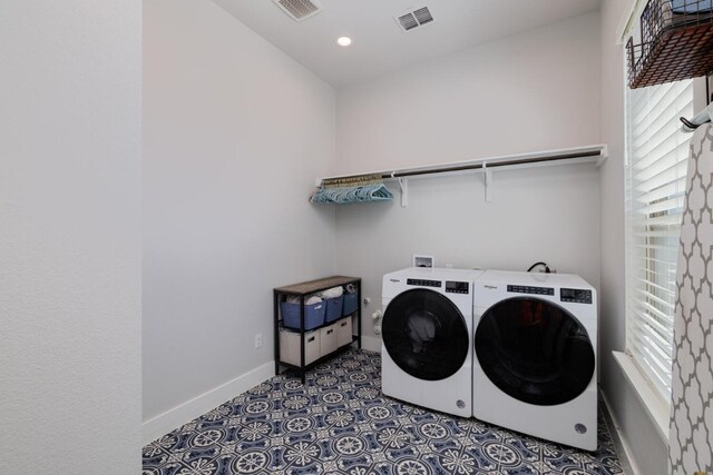 501 Francis Ct, Liberty Hill, TX 78642 - laundry room featuring plenty of natural light, baseboards, washing machine and clothes dryer, and recessed lighting