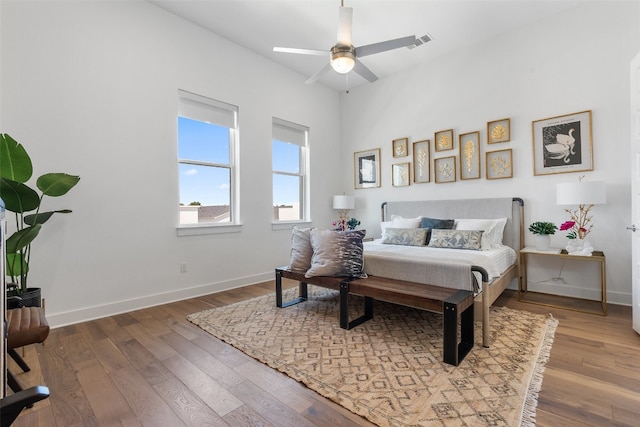 bedroom featuring hardwood / wood-style floors and ceiling fan