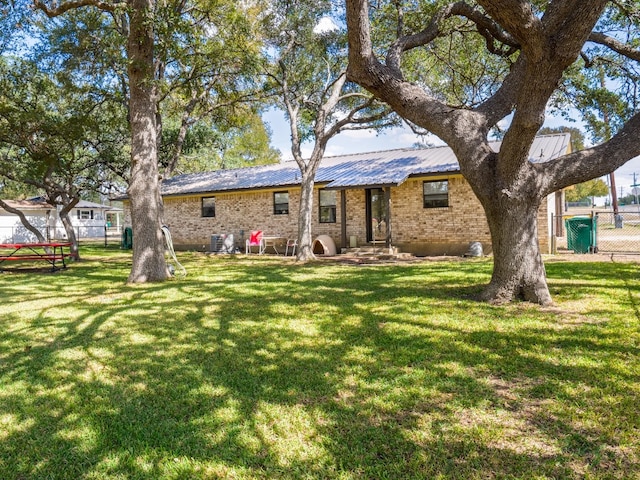 exterior space featuring a front yard