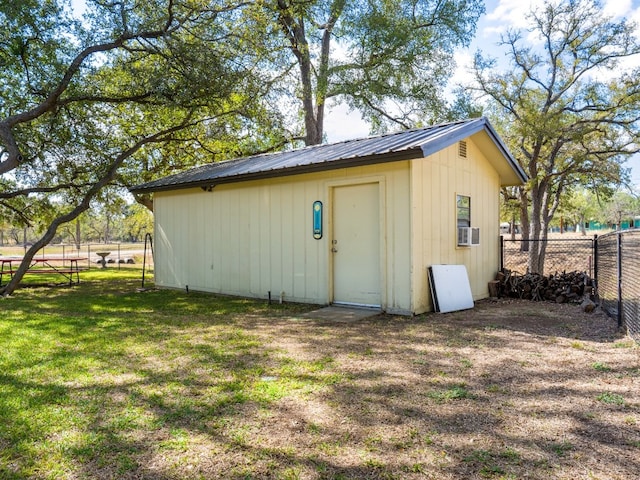 view of outdoor structure featuring a yard