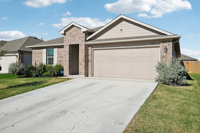 ranch-style home featuring a front lawn and a garage