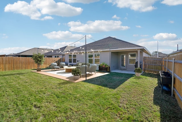 back of property with an outdoor living space, a yard, and a patio