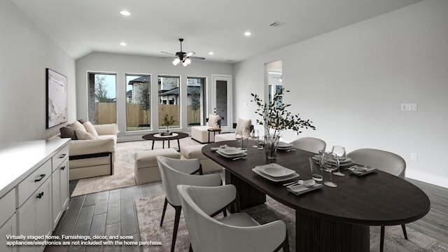 dining area featuring recessed lighting, visible vents, vaulted ceiling, ceiling fan, and wood finished floors