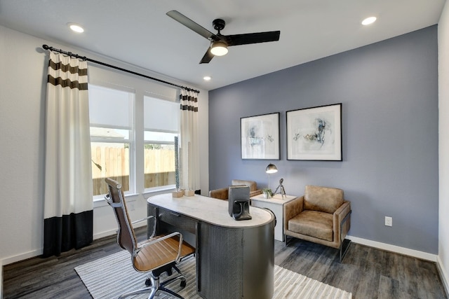 office area with ceiling fan and dark hardwood / wood-style flooring