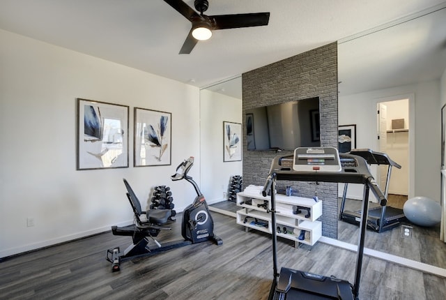 workout area with wood-type flooring and ceiling fan