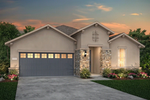 view of front of property featuring a garage