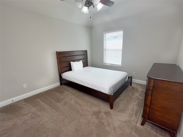 bedroom featuring ceiling fan and carpet flooring