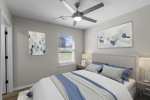 208 Bright Leaf Trl, Georgetown, TX 78633 - bedroom with wood finished floors, baseboards, and ceiling fan