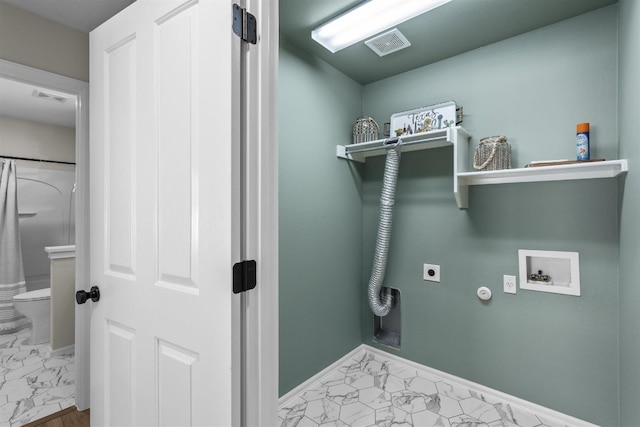 laundry room with hookup for a washing machine, hookup for a gas dryer, and hookup for an electric dryer