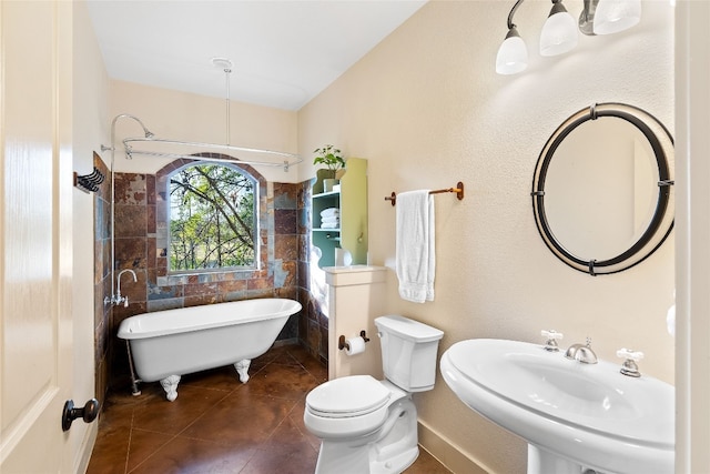 full bathroom featuring sink, tile patterned flooring, separate shower and tub, and toilet