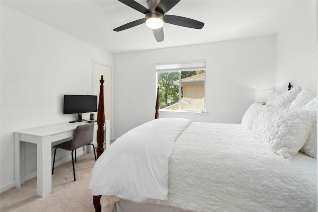 bedroom with light colored carpet and ceiling fan