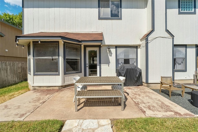 back of house with a patio