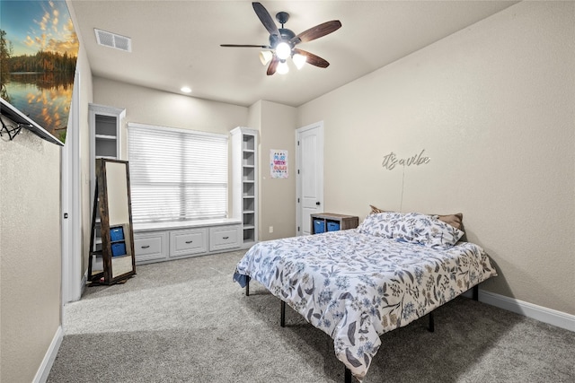 carpeted bedroom featuring ceiling fan