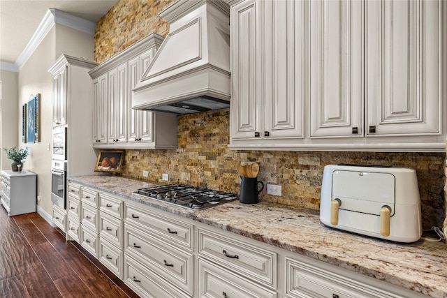 kitchen featuring stainless steel appliances, dark hardwood / wood-style flooring, custom range hood, decorative backsplash, and ornamental molding