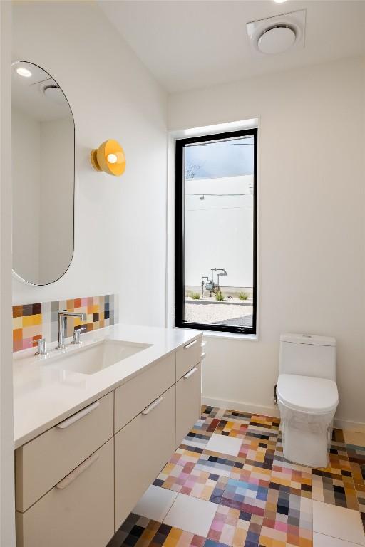 2112 Lawnmont Ave, Austin, TX 78756 - bathroom featuring vanity and tile patterned floors