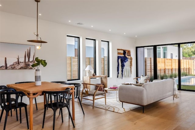 2112 Lawnmont Ave, Austin, TX 78756 - living area featuring light wood-style flooring and recessed lighting