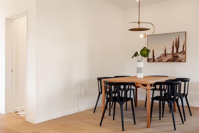 2112 Lawnmont Ave, Austin, TX 78756 - dining space featuring wood finished floors and baseboards