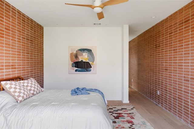 2112 Lawnmont Ave, Austin, TX 78756 - bedroom featuring wood finished floors and a ceiling fan