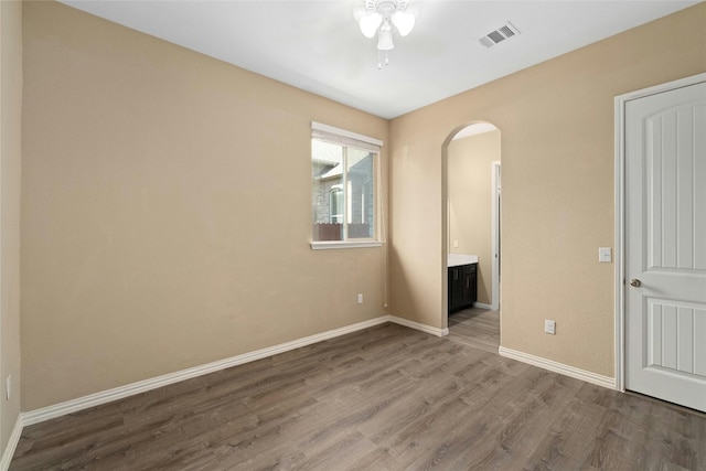 unfurnished bedroom featuring hardwood / wood-style floors