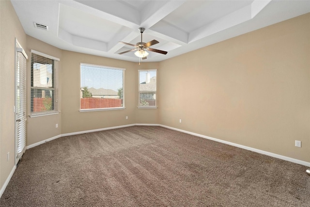 carpeted spare room with ceiling fan, beamed ceiling, and coffered ceiling