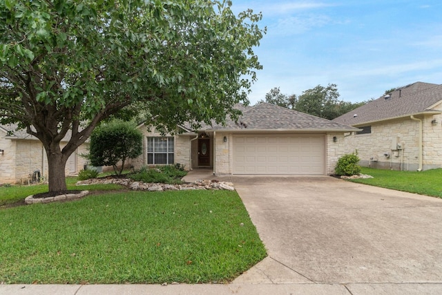 ranch-style house with a garage and a front lawn