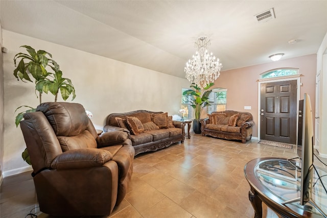 living room with an inviting chandelier