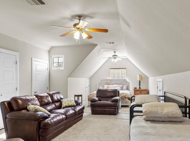 carpeted bedroom featuring ceiling fan and lofted ceiling