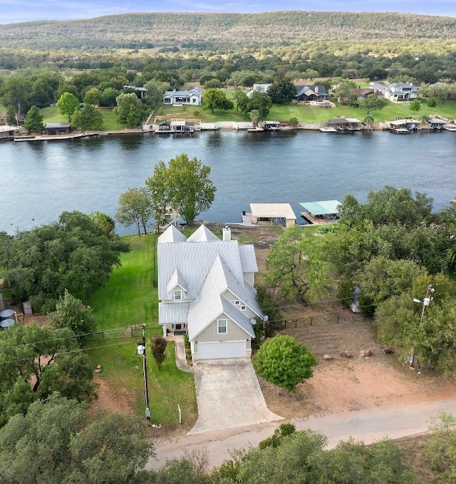 drone / aerial view with a water view