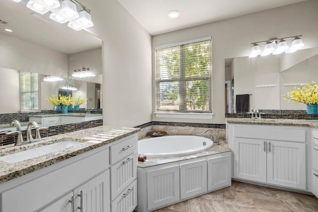 bathroom featuring a bathtub and vanity