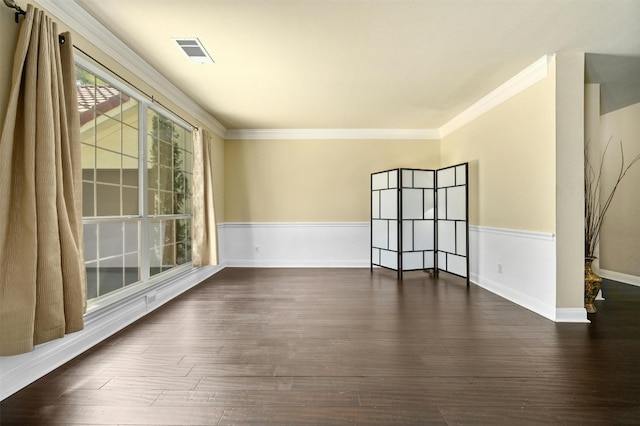 unfurnished room with crown molding and dark hardwood / wood-style floors