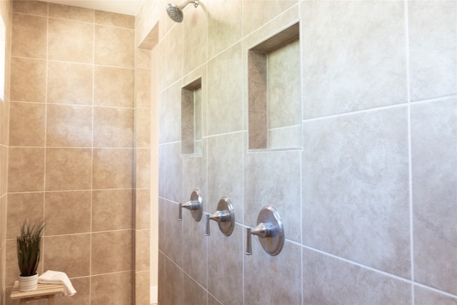 details featuring a tile shower