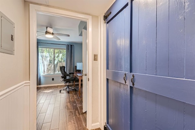 4910 Pelham Dr, Austin, TX 78727 - office space featuring wood finished floors, electric panel, and a ceiling fan