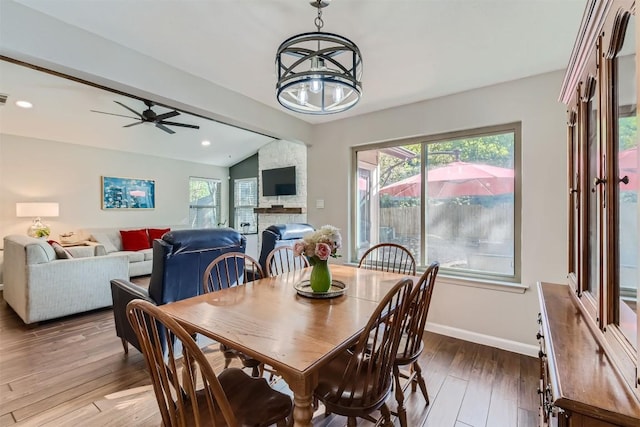 4910 Pelham Dr, Austin, TX 78727 - dining area featuring vaulted ceiling, wood finished floors, a ceiling fan, and recessed lighting
