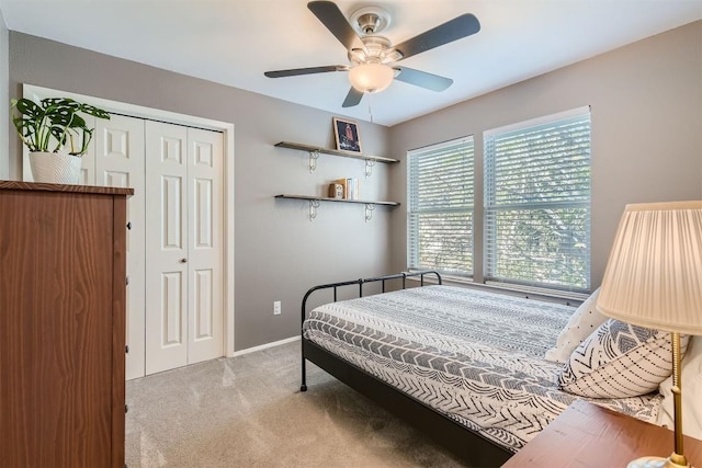 4910 Pelham Dr, Austin, TX 78727 - bedroom featuring light colored carpet, a closet, and ceiling fan