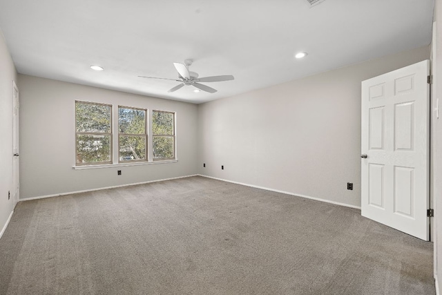 4910 Pelham Dr, Austin, TX 78727 - carpeted empty room with a ceiling fan and recessed lighting